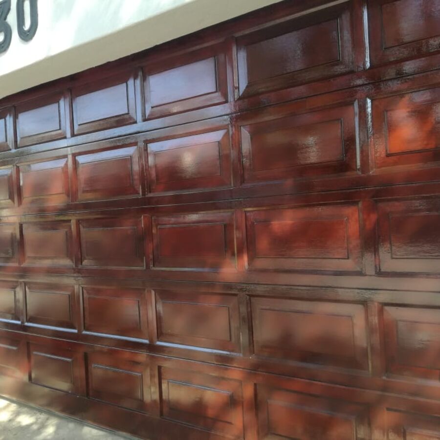Wooden garage door sanded and varnished