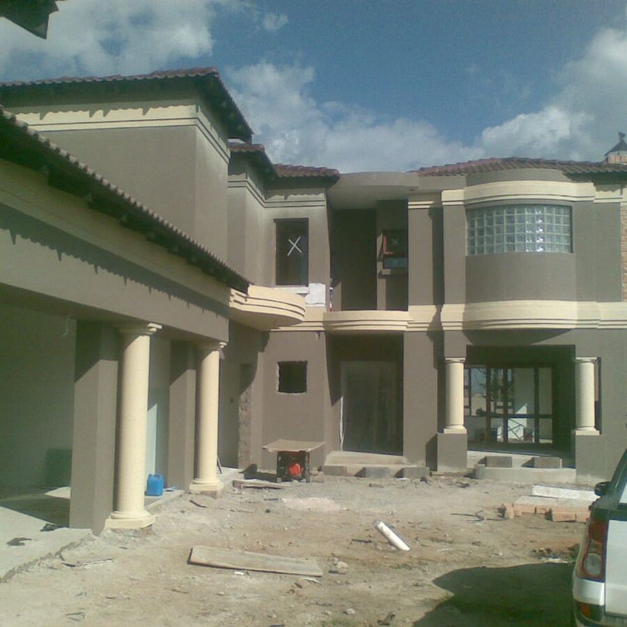 Exterior painting on a new double-storey house