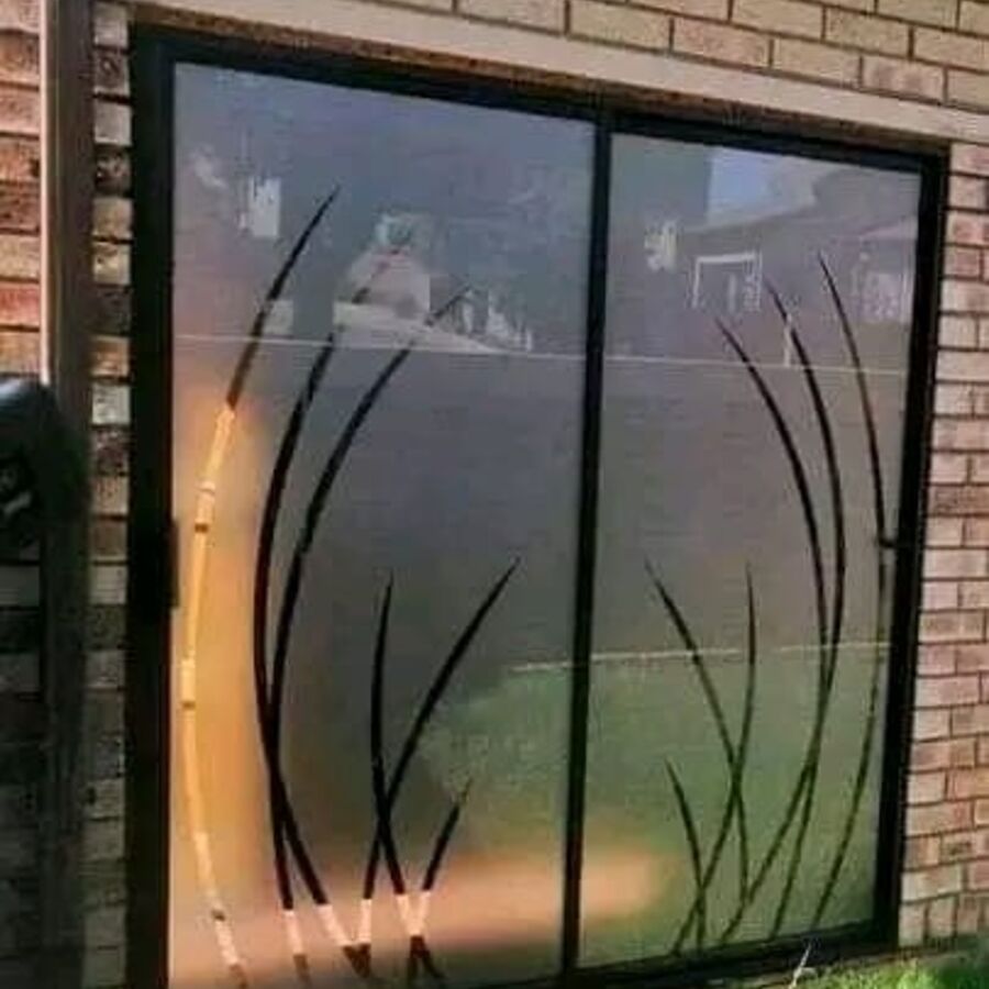 Decorative frosted film on a sliding door