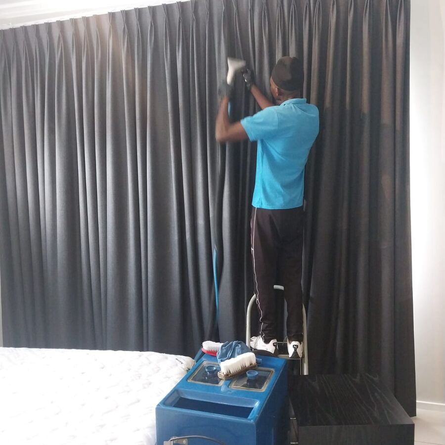 Curtain cleaning in a bedroom